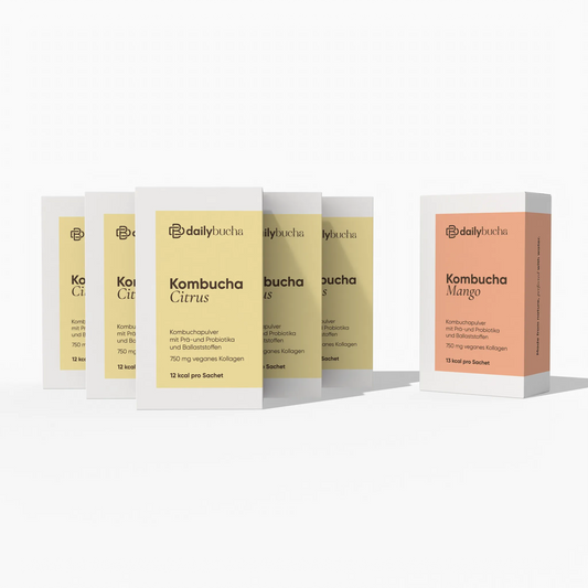 Daily Bucha Daily Rituals Set mit fünf Zitronen-Kombucha Box und einer Mango-Kombucha Box - Vorderseite der Verpackungen